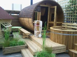 Photo SAUNA D'EXTERIEUR EN BOIS avec POLE A BOIS