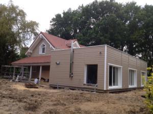 Photo conseil en construction de maisons en bois massif